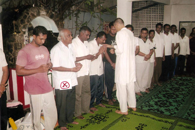 Acharya Satyananda present Prasad to Professor W.M. Gunatilaka Acharya Satyananda present Prasad to Professor W.M. Gunatilaka